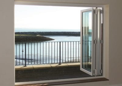 Aluminium bi-folding doors - Orchard Home Improvements Stamford